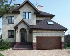 Преимущества секционных ворот для гаража