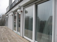 «Теплые» алюминиевые раздвижные двери ALUMIL (Греция)