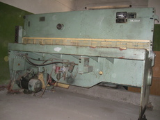 Гильотинные ножницы