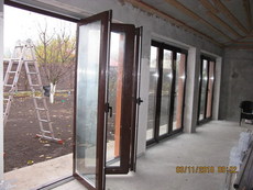 «Холодные» алюминиевые двери типа «гармошка» ALUPROF (Польша