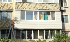 Обшивка сайдингом балкона лоджии