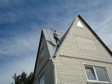 Чистка водосточной системы кровли