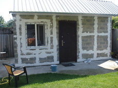 Отделка стен фасадов крошкой кремния.