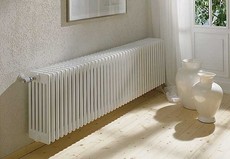 Установка радиаторов отопления в штатное место.