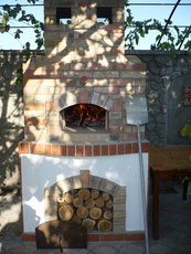 Печь для пиццы: черновая кладка с облицовкой или без.