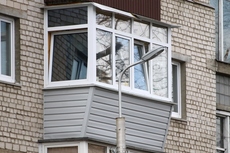 Обшивка балкона сайдингом в Киеве