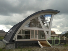 Деревянные дома из оцилиндрованного бревна.