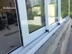Алюминиевые раздвижные двери на террасу
